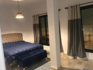 Ένα ή περισσότερα κρεβάτια σε δωμάτιο στο Dar Nouri