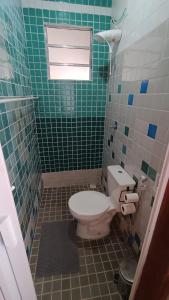 Koupelna v ubytování Chalé Elis 400m do centro - Serra do Cipó