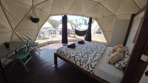 a bedroom with a bed in a tent at Blue Ocean Camp - Tasartico in Tasartico +107 photos