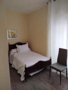 Una cama o camas en una habitación de MIKA Arevalo