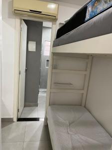 Ένα ή περισσότερα κρεβάτια σε δωμάτιο στο Studio Santorini Vila Mariana