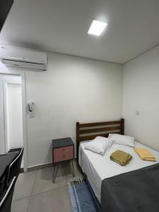 Ένα ή περισσότερα κρεβάτια σε δωμάτιο στο Studio Santorini Vila Mariana