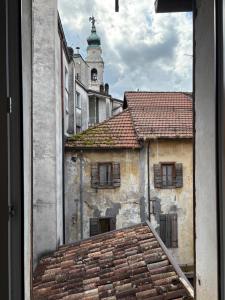 a view of an old building from a window at Mezzaterra 40 - Nel cuore del centro storico in Belluno +26 photos