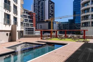 a swimming pool on the roof of a building at 705 Icon Luxury Apartments in Cape Town
