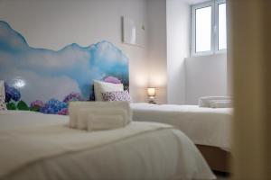 Ένα ή περισσότερα κρεβάτια σε δωμάτιο στο Milena Guest House +46 φωτογραφίες