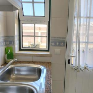 Kuchyň nebo kuchyňský kout v ubytování Apartamento Solar da São