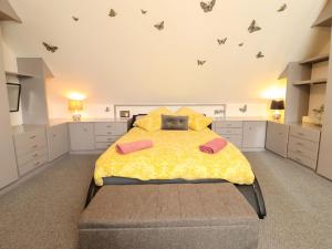 Postel nebo postele na pokoji v ubytování Peartree Cottage