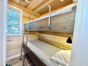a bunk bed in a tiny house at Escalante Escapes Tumble Weed- Bunk Escape in Escalante +20 photos