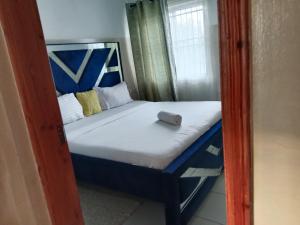 Postel nebo postele na pokoji v ubytování Buxton Point Kandy Epic Two Bedroom Apartments + 49 fotografií