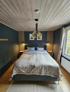 Postel nebo postele na pokoji v ubytování Villa Blackberry, nära Kolmården & Norrköping