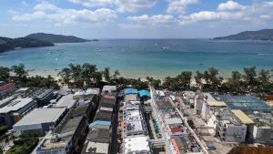 an aerial view of a city and the ocean at PATONG TOWER SPACIOUS FAMILIES APARTMENT with 2 BATHROOMS 3&4 BEDROOMS Pta in Patong Beach