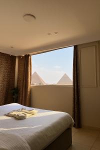 Photo de la galerie de l'établissement pharaoh pyramids hotel, au Caire