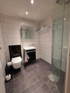 Ένα μπάνιο στο byNORD City Apartment - Vestregata 36b