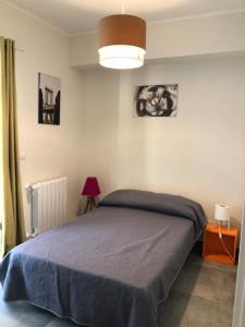 En eller flere senge i et værelse på Ammare apartament Milazzo