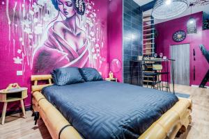 Postel nebo postele na pokoji v ubytování Les secrets de Julie - Love Room