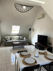 Posezení v ubytování Appartement lumineux avec entrée indépendante