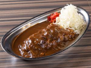 a plate of food with chili and coleslaw at APA Hotel Hakataeki Chikushiguchi in Fukuoka