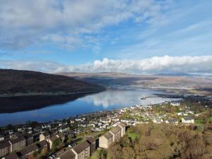 a view of a river with a town and a city at The Mountain Lake in Fort William
