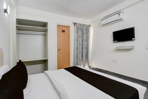 TV a/nebo společenská místnost v ubytování Hotel O Kalka + 21 fotografií