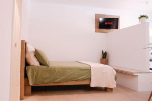 Katil atau katil-katil dalam bilik di Suite con spa privata disponibile su richiesta
