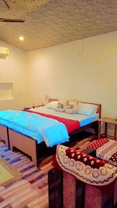 Postel nebo postele na pokoji v ubytování Blue Tree Resort