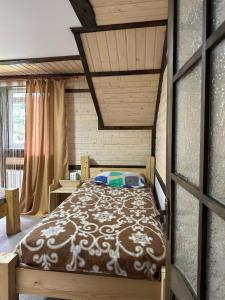 Una cama o camas en una habitación de 7+я