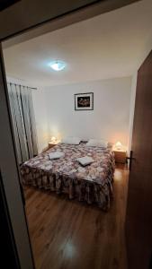 Katil atau katil-katil dalam bilik di Apartment Luana