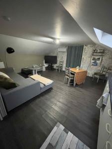 Posezení v ubytování Le meuble du pont