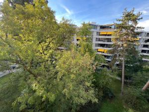 an overhead view of an apartment building with trees at Champel Cozy Studio in Geneva