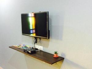 TV a/nebo společenská místnost v ubytování K Guesthouse Adults only