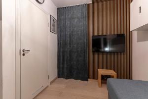 TV a/nebo společenská místnost v ubytování Studio - Sleeps 2 - Parking - Wifi