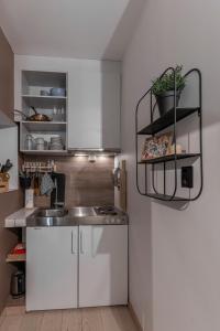 Kuchyň nebo kuchyňský kout v ubytování Studio - Sleeps 2 - Parking - Wifi