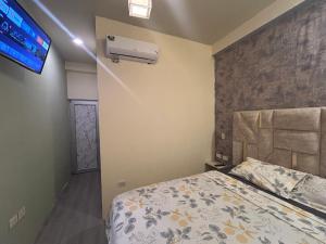 Postel nebo postele na pokoji v ubytování Ola House