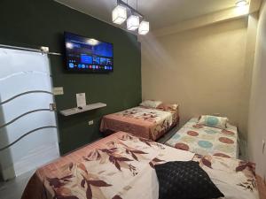Postel nebo postele na pokoji v ubytování Ola House