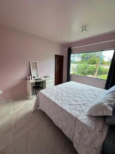 Postel nebo postele na pokoji v ubytování Chic Beach House