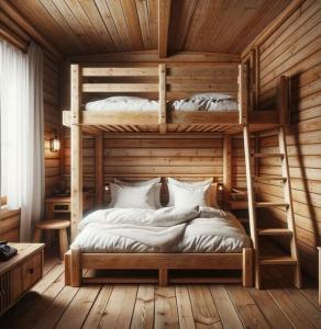 ラ・セレナにあるJpLODGEのキャビン内の二段ベッドが2つある寝室