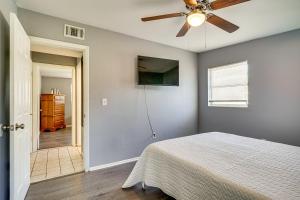 a bedroom with a bed and a ceiling fan at 5 Mi Circle B Bar Reserve Lakeland Getaway! in Lakeland