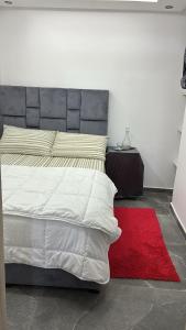 Ένα ή περισσότερα κρεβάτια σε δωμάτιο στο Studio LILA +5 φωτογραφίες