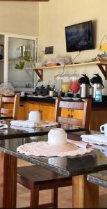 Η κουζίνα ή μικρή κουζίνα στο Residencial mandacaru