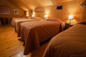 Postel nebo postele na pokoji v ubytování Riviera H + 4 fotografie