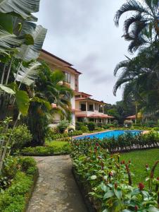 a view of the resort from the garden at Navilehomestay in Candolim