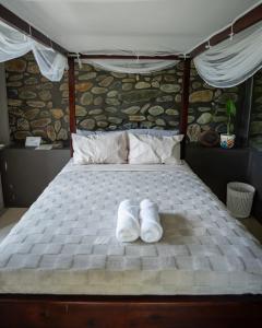 Postel nebo postele na pokoji v ubytování Shade