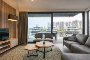 Posezení v ubytování Hello Zeeland - Veerse Wende - Zeekraal 14