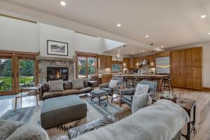 a living room with couches and a fireplace at Mountain Lodge Oasis w Hot Tub-Rio Grande Trail in Carbondale