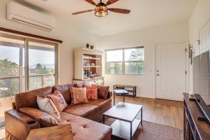 a living room with a couch and a ceiling fan at Prescott Home Close to Hiking and Medical Centers! in Granite Dells