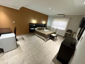 Ένα ή περισσότερα κρεβάτια σε δωμάτιο στο El Condor Hotel SPA +48 φωτογραφίες