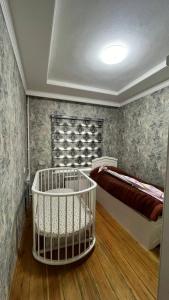 Postel nebo postele na pokoji v ubytování 3-комнатная квартира в Андижане