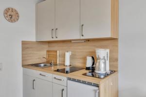 Η κουζίνα ή μικρή κουζίνα στο Charmante Ferienwohnung mit Terrasse nahe der Schlei und Ostsseestrand