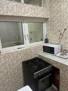 Kuchyň nebo kuchyňský kout v ubytování Havre de paix