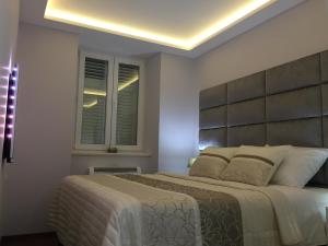 Postel nebo postele na pokoji v ubytování Touched VIP Zadar